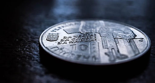 Kraken позволил получать гривну наличными через MoneyGram