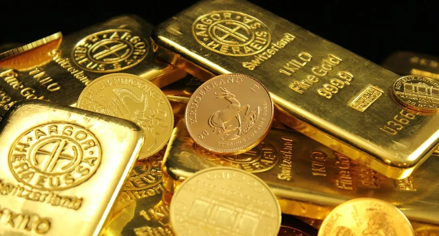 Ціни на золото падають через очікування підвищення ставок Fed